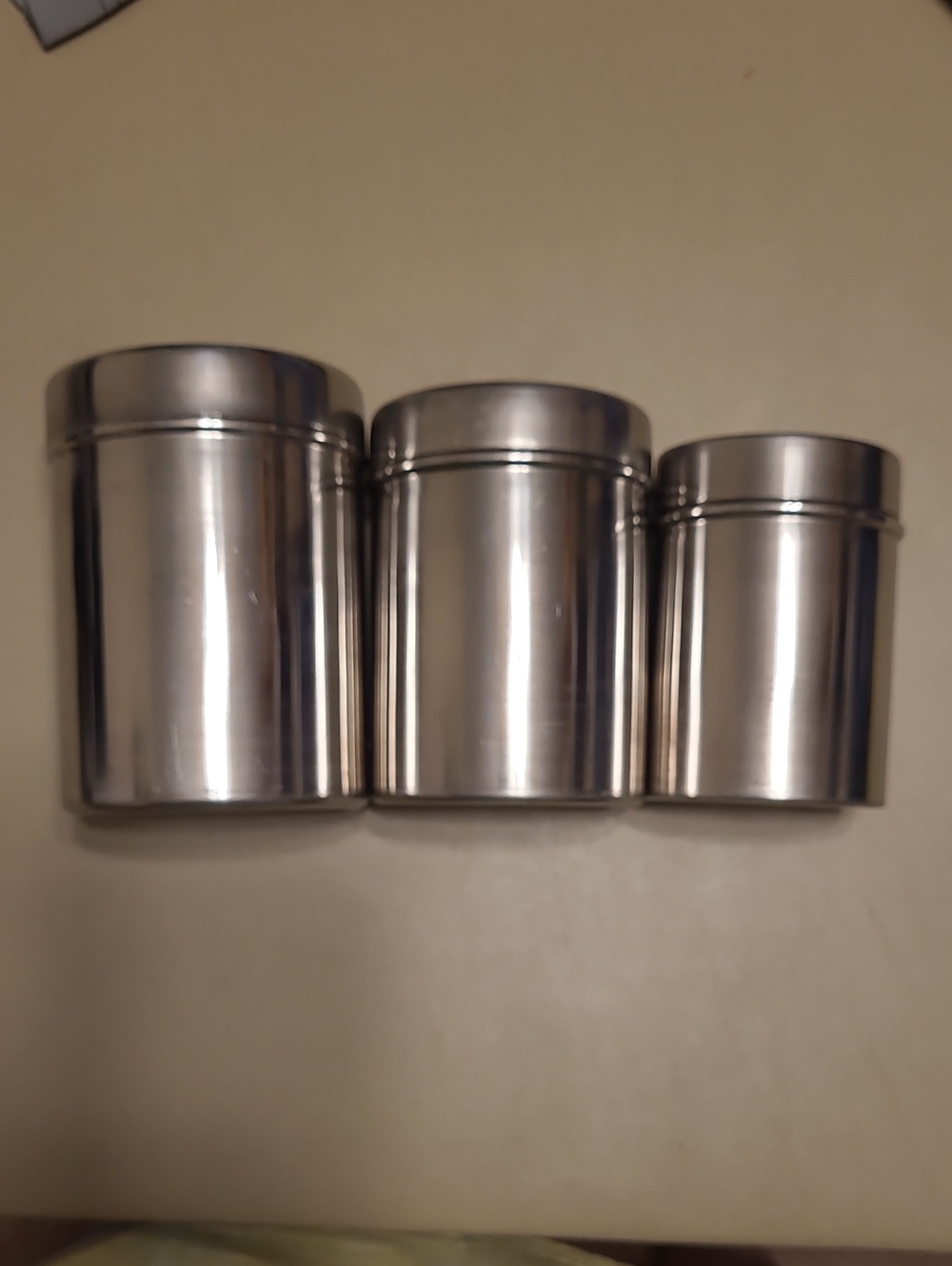 Small Nesting Canisters.  Set Of 3 metal Canisters.